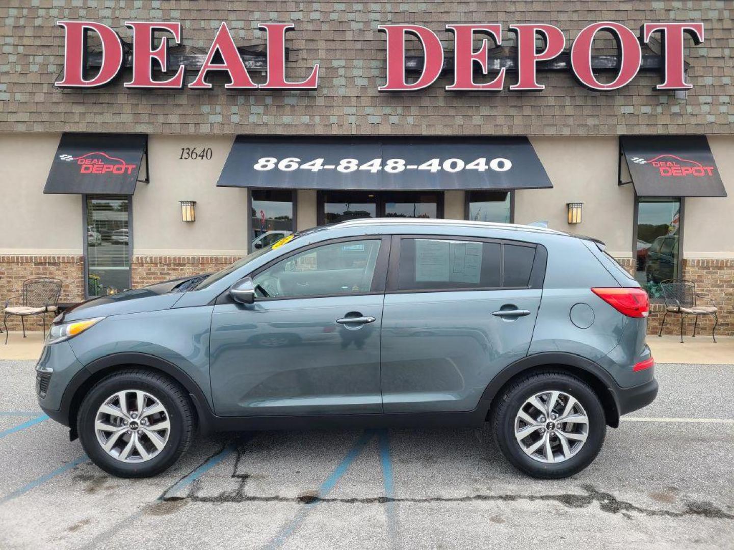 2015 BLUE KIA SPORTAGE LX (KNDPB3AC4F7) with an 2.4L engine, Automatic transmission, located at 13640 E Wade Hampton Blvd, Greer, SC, 29651, (864) 848-4040, 34.950825, -82.197464 - Photo#0