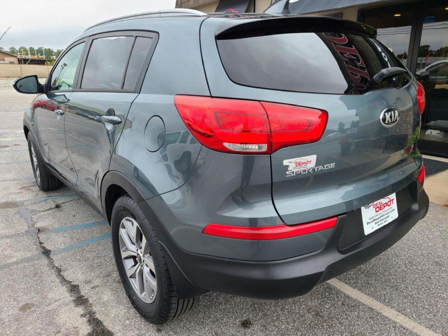 2015 BLUE KIA SPORTAGE LX (KNDPB3AC4F7) with an 2.4L engine, Automatic transmission, located at 13640 E Wade Hampton Blvd, Greer, SC, 29651, (864) 848-4040, 34.950825, -82.197464 - Photo#4