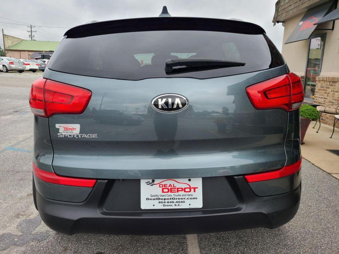 2015 BLUE KIA SPORTAGE LX (KNDPB3AC4F7) with an 2.4L engine, Automatic transmission, located at 13640 E Wade Hampton Blvd, Greer, SC, 29651, (864) 848-4040, 34.950825, -82.197464 - Photo#5