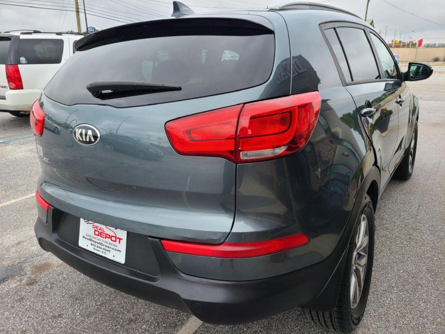 2015 BLUE KIA SPORTAGE LX (KNDPB3AC4F7) with an 2.4L engine, Automatic transmission, located at 13640 E Wade Hampton Blvd, Greer, SC, 29651, (864) 848-4040, 34.950825, -82.197464 - Photo#6