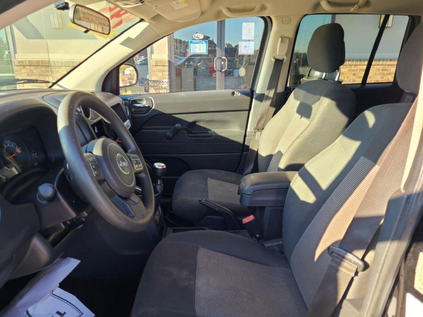 2014 BLACK JEEP COMPASS SPORT (1C4NJCBA8ED) with an 2.0L engine, Continuously Variable transmission, located at 13640 E Wade Hampton Blvd, Greer, SC, 29651, (864) 848-4040, 34.950825, -82.197464 - Photo#9