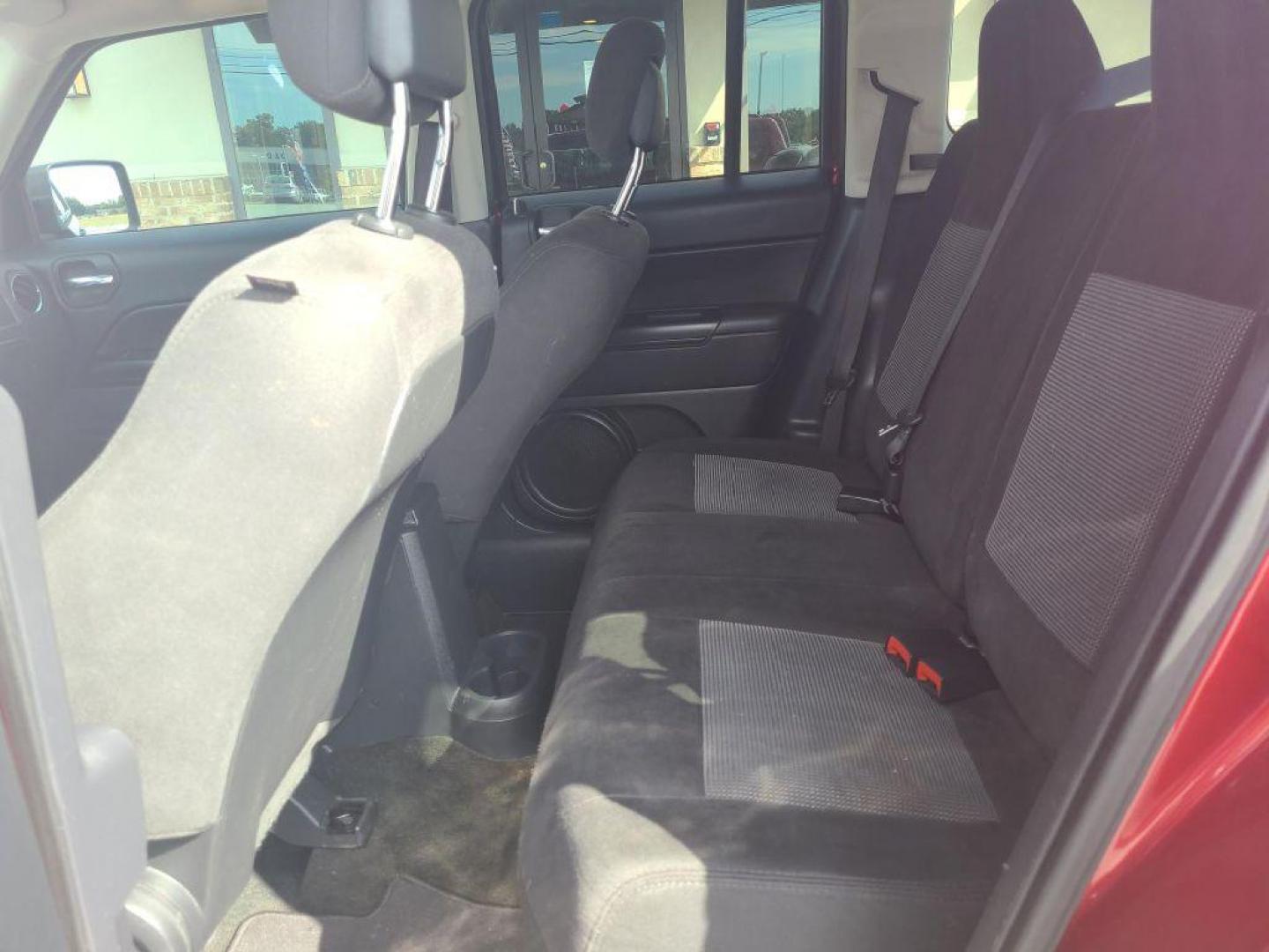 2016 RED JEEP PATRIOT SPORT (1C4NJPBB4GD) with an 2.4L engine, Continuously Variable transmission, located at 13640 E Wade Hampton Blvd, Greer, SC, 29651, (864) 848-4040, 34.950825, -82.197464 - Photo#10