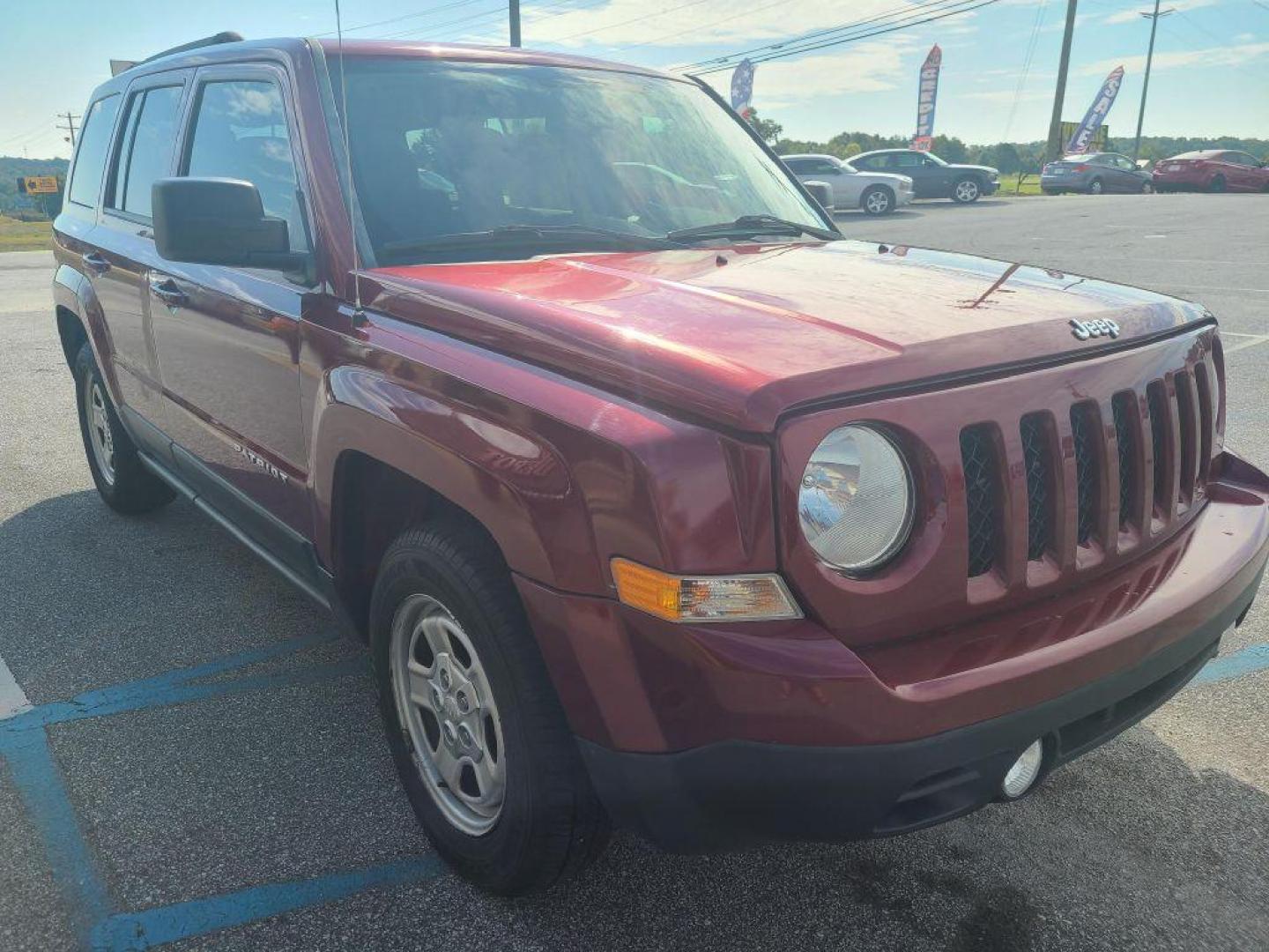 2016 RED JEEP PATRIOT SPORT (1C4NJPBB4GD) with an 2.4L engine, Continuously Variable transmission, located at 13640 E Wade Hampton Blvd, Greer, SC, 29651, (864) 848-4040, 34.950825, -82.197464 - Photo#3