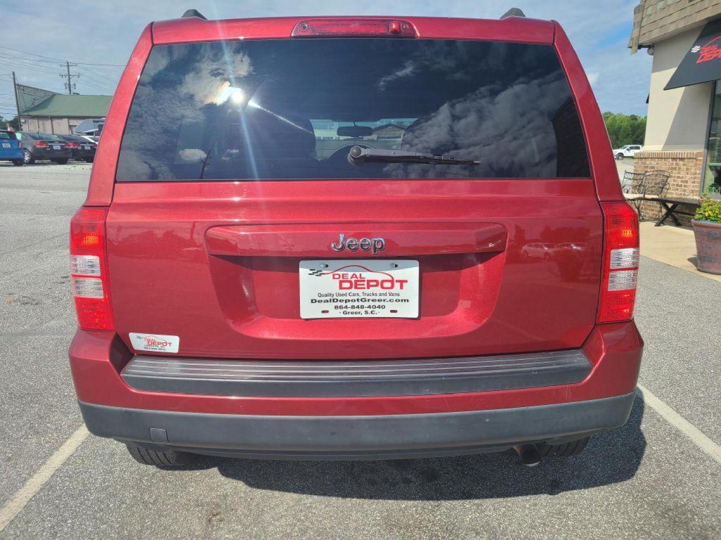2016 RED JEEP PATRIOT SPORT (1C4NJPBB4GD) with an 2.4L engine, Continuously Variable transmission, located at 13640 E Wade Hampton Blvd, Greer, SC, 29651, (864) 848-4040, 34.950825, -82.197464 - Photo#5