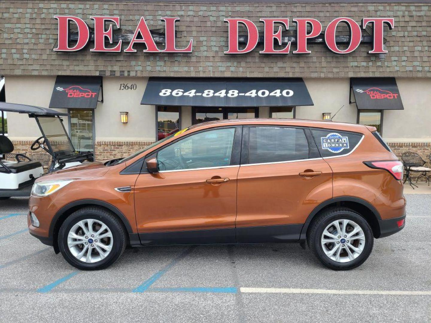 2017 ORANGE FORD ESCAPE SE (1FMCU0GDXHU) with an 1.5L engine, Automatic transmission, located at 13640 E Wade Hampton Blvd, Greer, SC, 29651, (864) 848-4040, 34.950825, -82.197464 - Photo#0