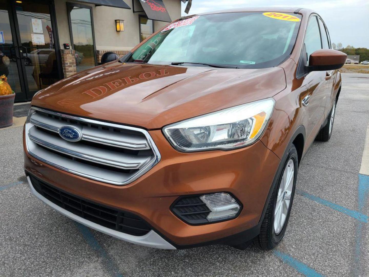 2017 ORANGE FORD ESCAPE SE (1FMCU0GDXHU) with an 1.5L engine, Automatic transmission, located at 13640 E Wade Hampton Blvd, Greer, SC, 29651, (864) 848-4040, 34.950825, -82.197464 - Photo#1