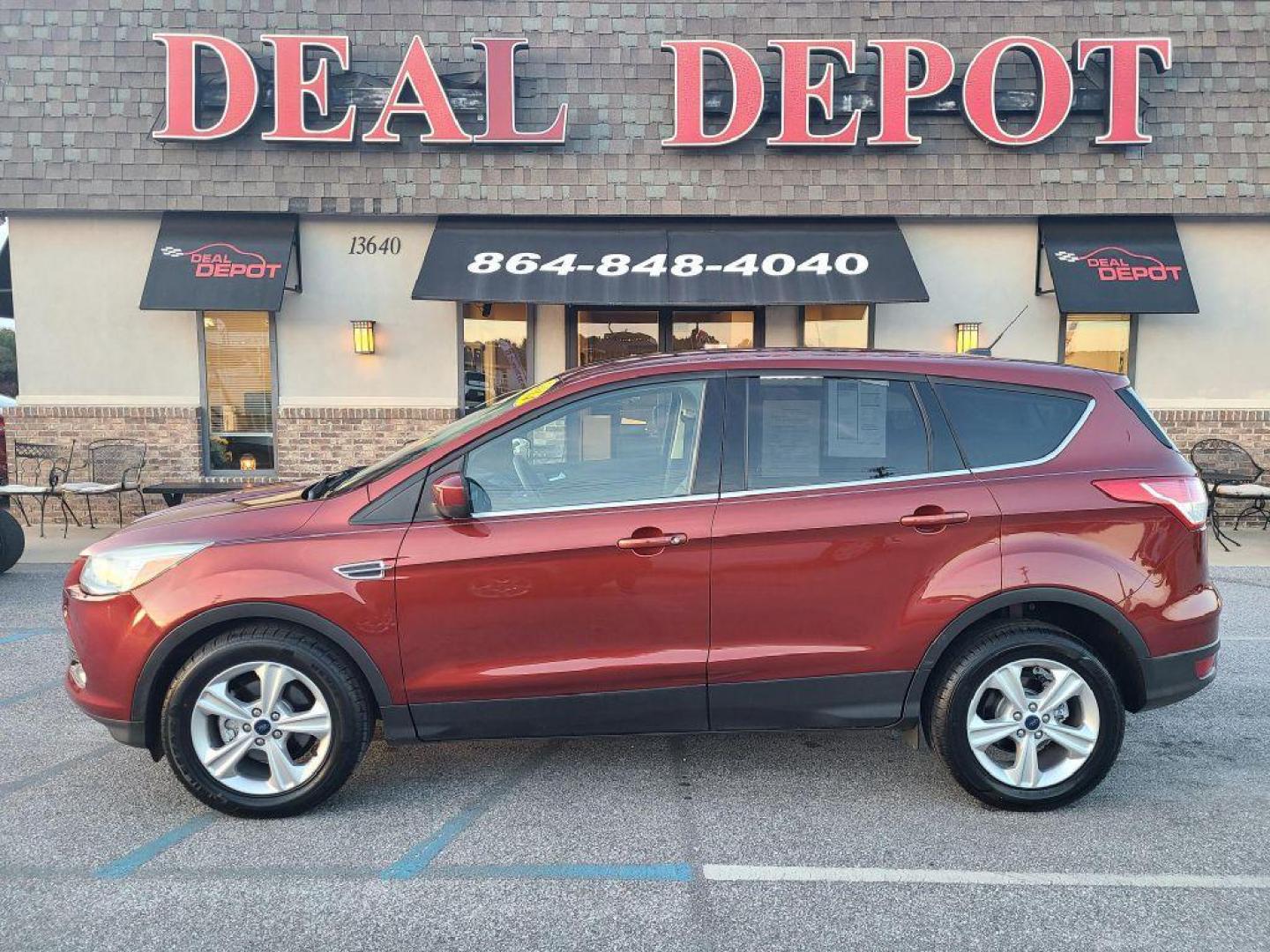 2014 OR/RED FORD ESCAPE SE (1FMCU0GX4EU) with an 1.6L engine, Automatic transmission, located at 13640 E Wade Hampton Blvd, Greer, SC, 29651, (864) 848-4040, 34.950825, -82.197464 - Photo#0