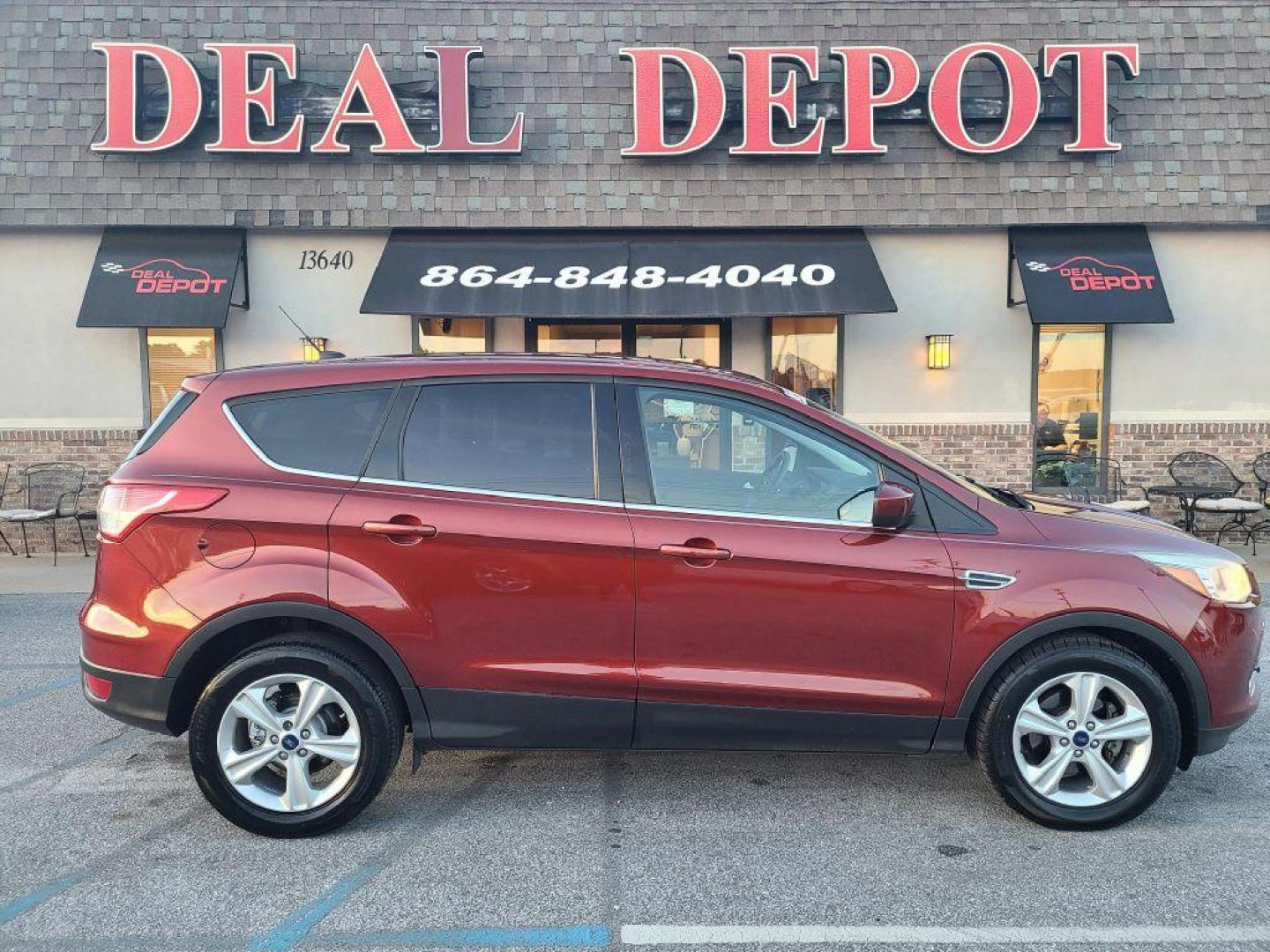2014 OR/RED FORD ESCAPE SE (1FMCU0GX4EU) with an 1.6L engine, Automatic transmission, located at 13640 E Wade Hampton Blvd, Greer, SC, 29651, (864) 848-4040, 34.950825, -82.197464 - Photo#12