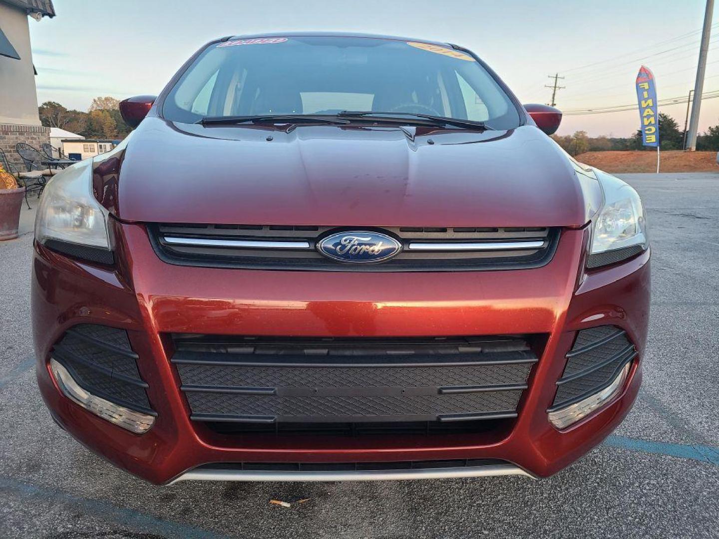 2014 OR/RED FORD ESCAPE SE (1FMCU0GX4EU) with an 1.6L engine, Automatic transmission, located at 13640 E Wade Hampton Blvd, Greer, SC, 29651, (864) 848-4040, 34.950825, -82.197464 - Photo#2