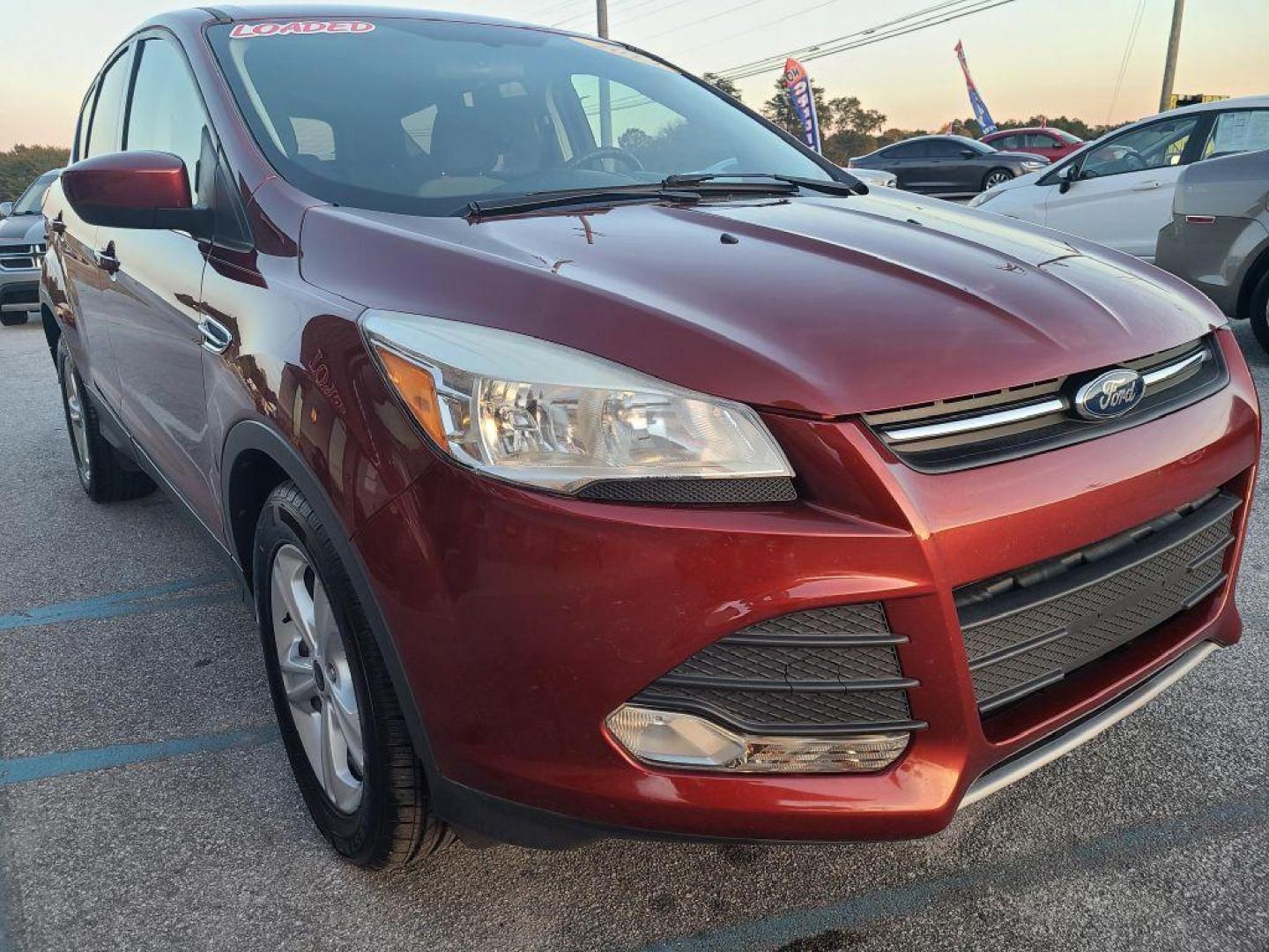 2014 OR/RED FORD ESCAPE SE (1FMCU0GX4EU) with an 1.6L engine, Automatic transmission, located at 13640 E Wade Hampton Blvd, Greer, SC, 29651, (864) 848-4040, 34.950825, -82.197464 - Photo#3