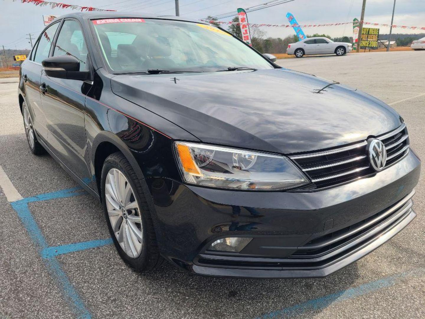 2015 BLACK VOLKSWAGEN JETTA SE PZEV (3VWD17AJ7FM) with an 1.8L engine, Automatic transmission, located at 13640 E Wade Hampton Blvd, Greer, SC, 29651, (864) 848-4040, 34.950825, -82.197464 - Photo#3
