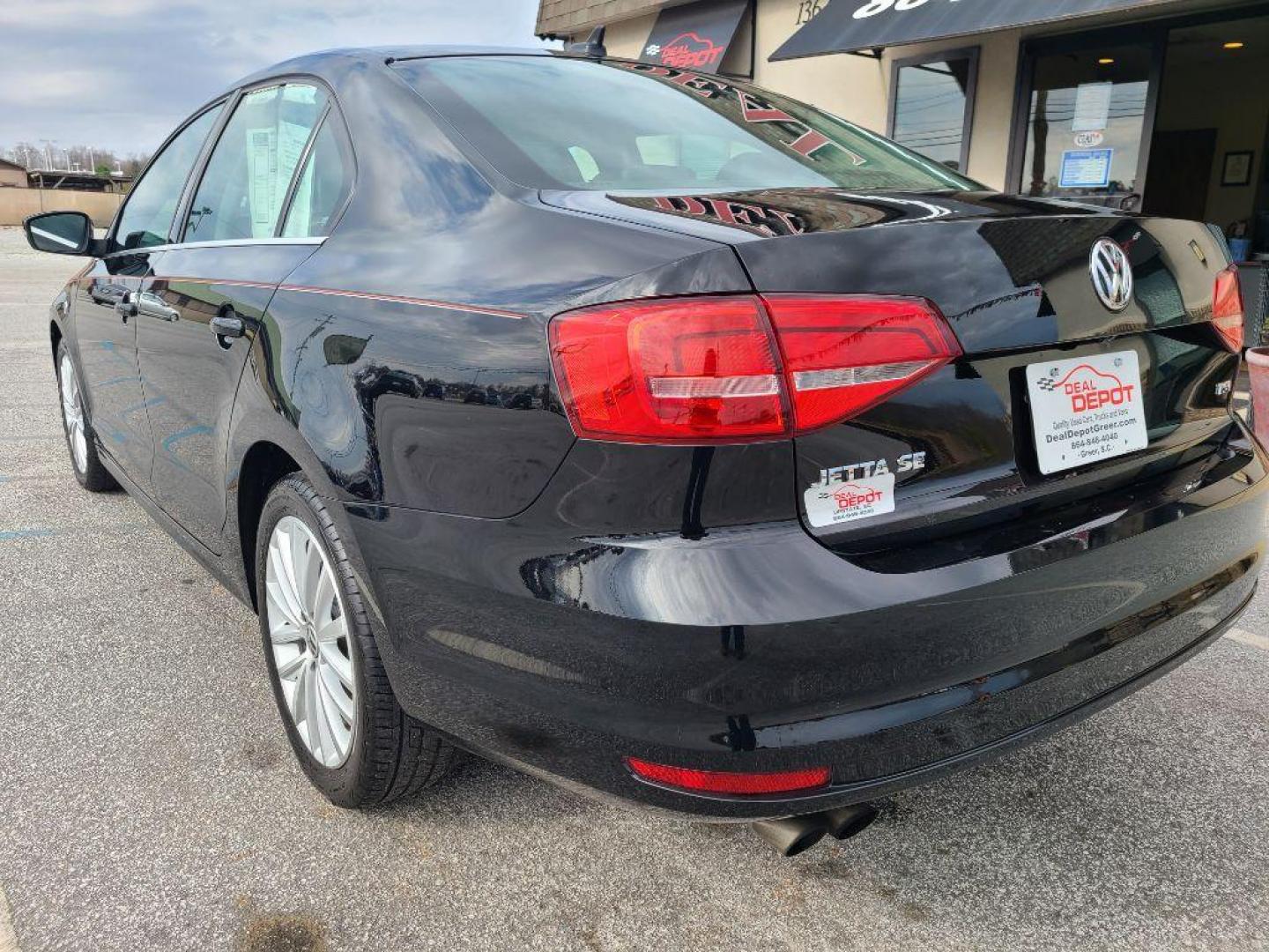 2015 BLACK VOLKSWAGEN JETTA SE PZEV (3VWD17AJ7FM) with an 1.8L engine, Automatic transmission, located at 13640 E Wade Hampton Blvd, Greer, SC, 29651, (864) 848-4040, 34.950825, -82.197464 - Photo#4