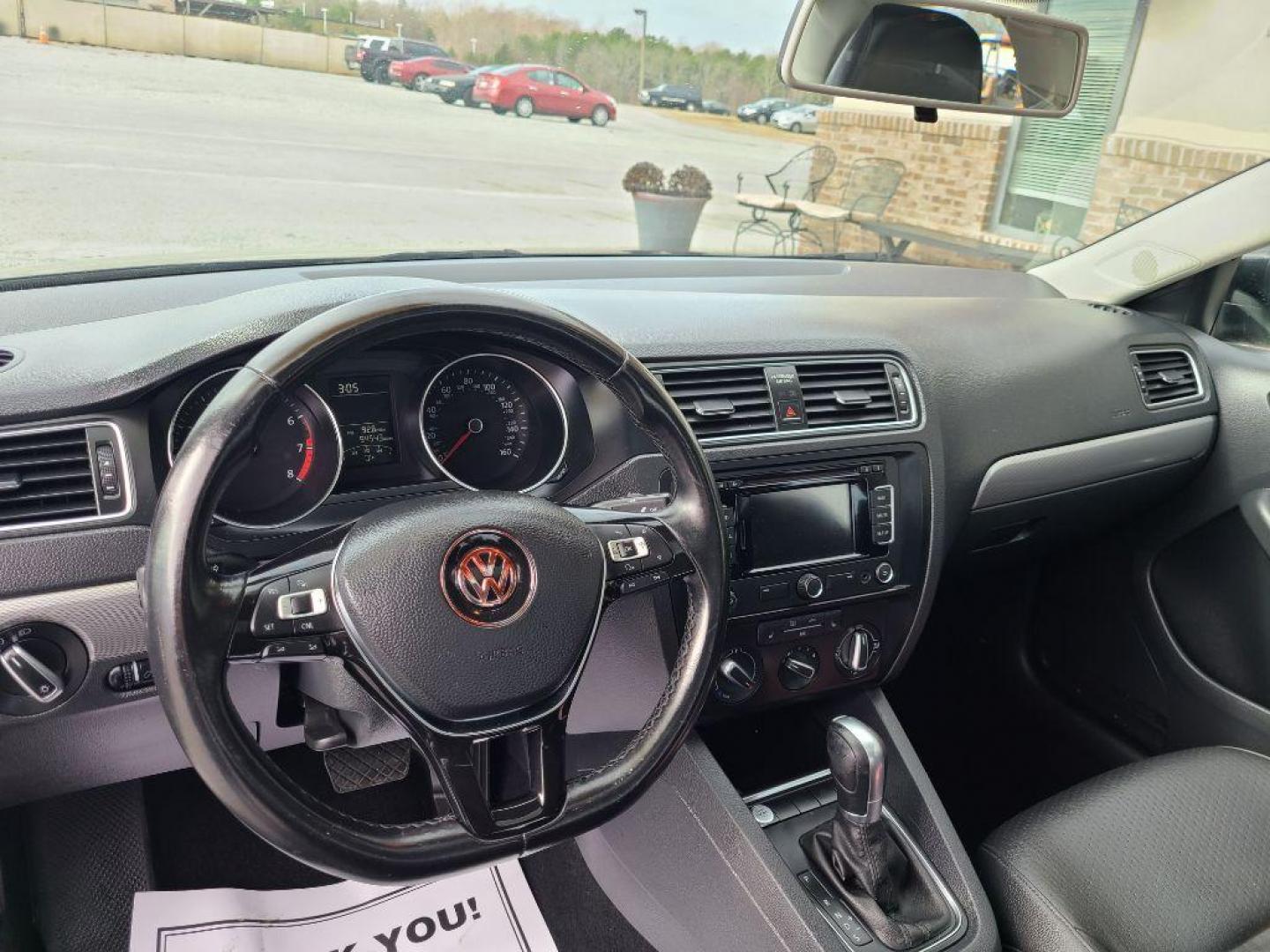 2015 BLACK VOLKSWAGEN JETTA SE PZEV (3VWD17AJ7FM) with an 1.8L engine, Automatic transmission, located at 13640 E Wade Hampton Blvd, Greer, SC, 29651, (864) 848-4040, 34.950825, -82.197464 - Photo#8