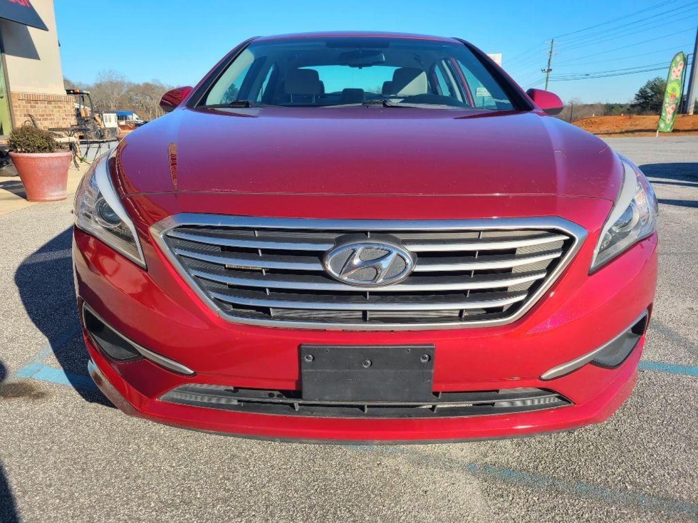 2016 RED HYUNDAI SONATA BASE (5NPE24AF7GH) with an 2.4L engine, Automatic transmission, located at 13640 E Wade Hampton Blvd, Greer, SC, 29651, (864) 848-4040, 34.950825, -82.197464 - Photo#2
