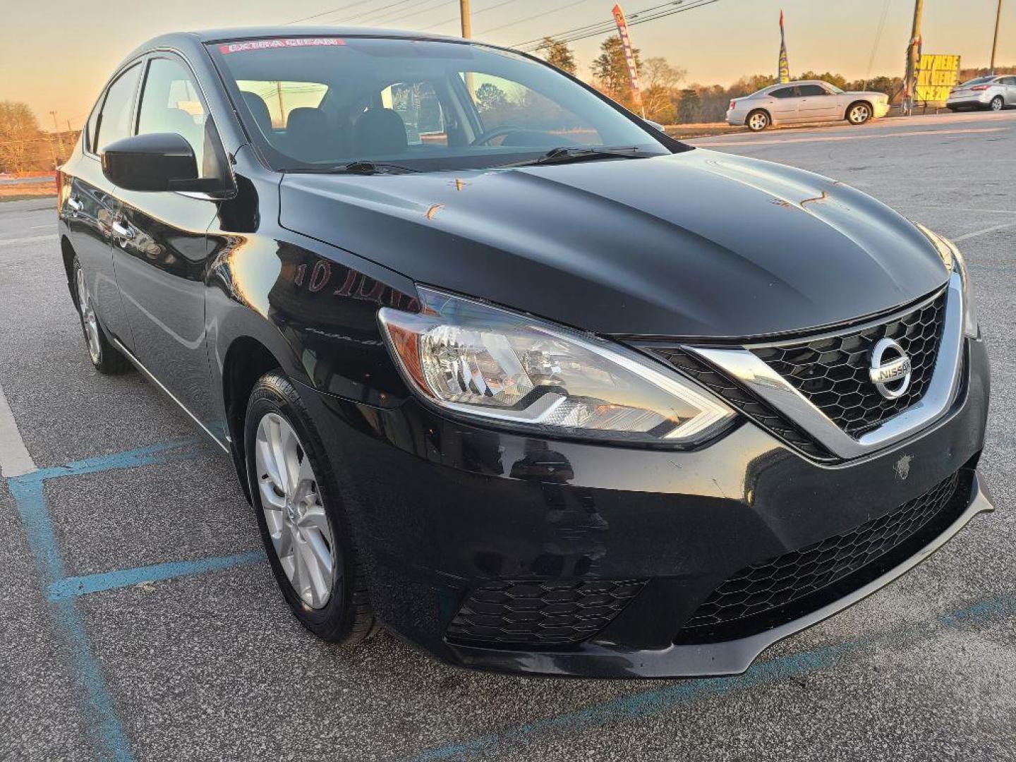 2017 BLACK NISSAN SENTRA (3N1AB7AP2HY) with an 1.8L engine, Automatic transmission, located at 13640 E Wade Hampton Blvd, Greer, SC, 29651, (864) 848-4040, 34.950825, -82.197464 - Photo#3