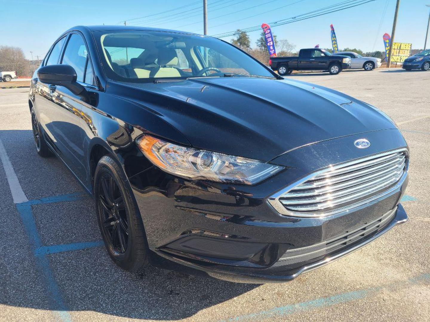 2017 BLACK FORD FUSION S (3FA6P0G74HR) with an 2.5L engine, Automatic transmission, located at 13640 E Wade Hampton Blvd, Greer, SC, 29651, (864) 848-4040, 34.950825, -82.197464 - Photo#3