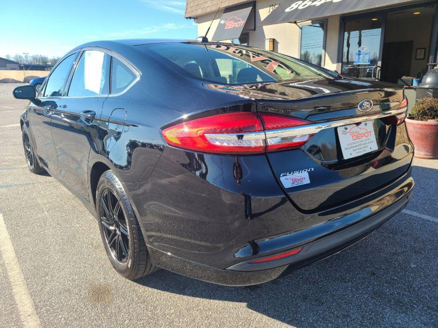 2017 BLACK FORD FUSION S (3FA6P0G74HR) with an 2.5L engine, Automatic transmission, located at 13640 E Wade Hampton Blvd, Greer, SC, 29651, (864) 848-4040, 34.950825, -82.197464 - Photo#4