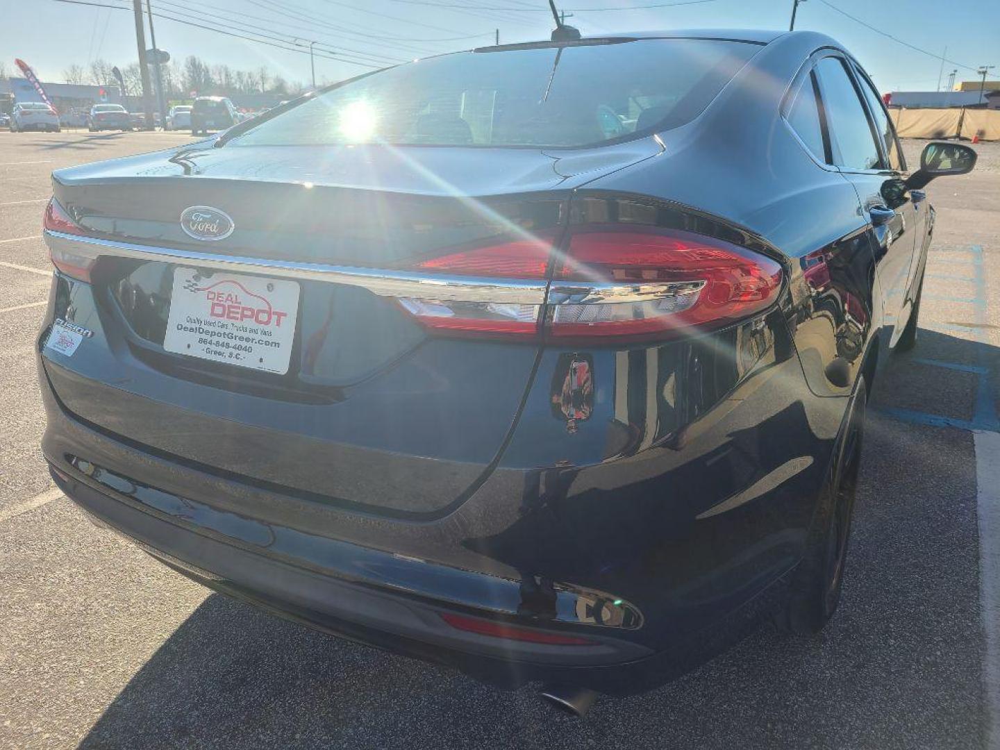 2017 BLACK FORD FUSION S (3FA6P0G74HR) with an 2.5L engine, Automatic transmission, located at 13640 E Wade Hampton Blvd, Greer, SC, 29651, (864) 848-4040, 34.950825, -82.197464 - Photo#6
