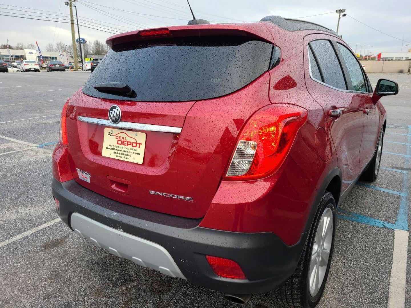 2015 RED BUICK ENCORE BASE (KL4CJASB0FB) with an 1.4L engine, Automatic transmission, located at 13640 E Wade Hampton Blvd, Greer, SC, 29651, (864) 848-4040, 34.950825, -82.197464 - Photo#6