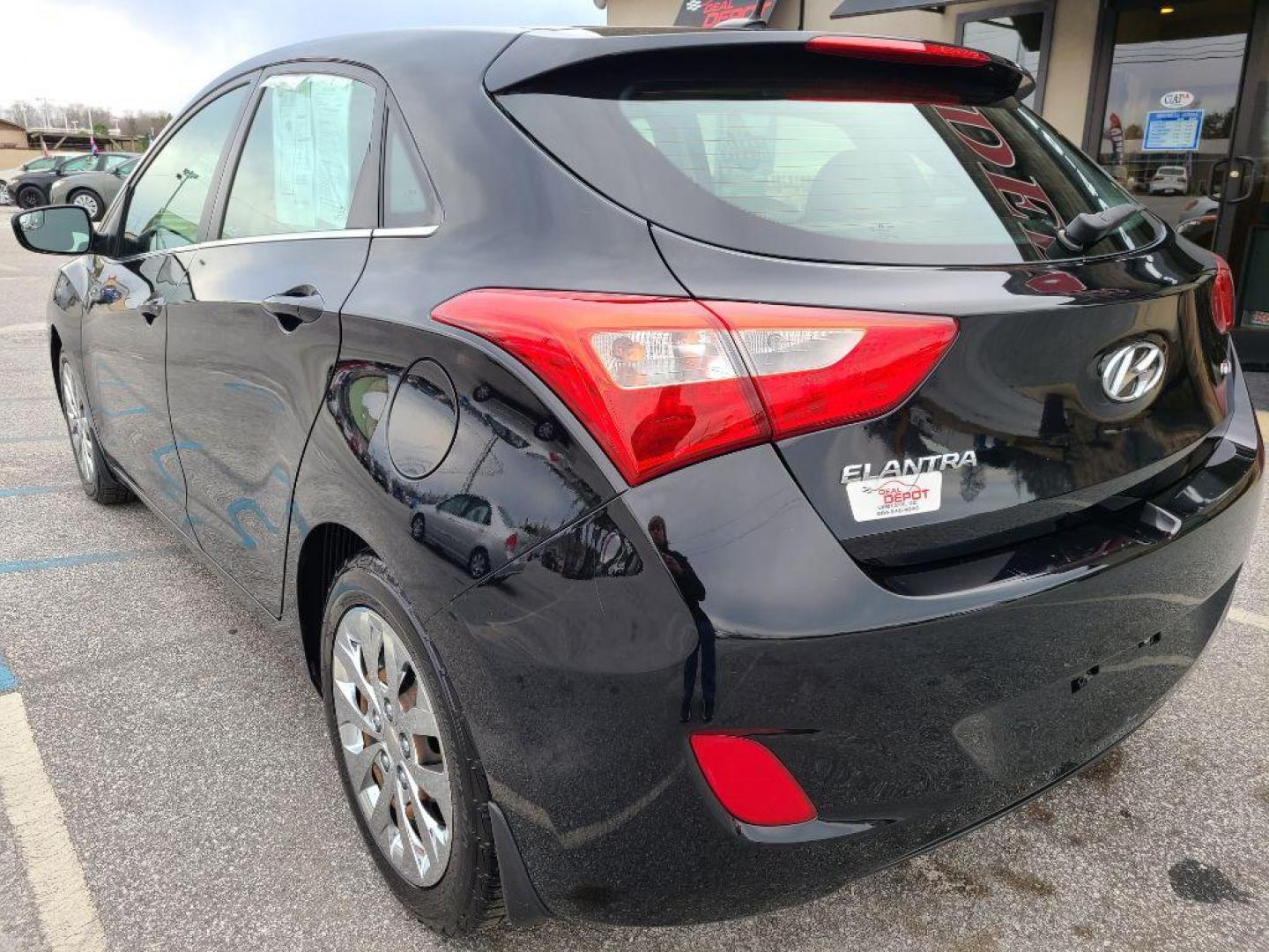 2016 BLACK HYUNDAI ELANTRA GT BASE (KMHD35LH2GU) with an 2.0L engine, 6-Speed Manual transmission, located at 13640 E Wade Hampton Blvd, Greer, SC, 29651, (864) 848-4040, 34.950825, -82.197464 - Photo#4