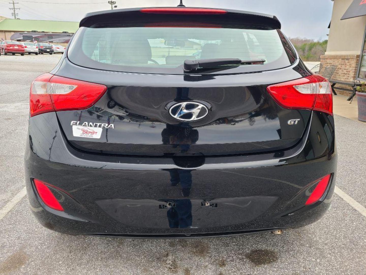 2016 BLACK HYUNDAI ELANTRA GT BASE (KMHD35LH2GU) with an 2.0L engine, 6-Speed Manual transmission, located at 13640 E Wade Hampton Blvd, Greer, SC, 29651, (864) 848-4040, 34.950825, -82.197464 - Photo#5