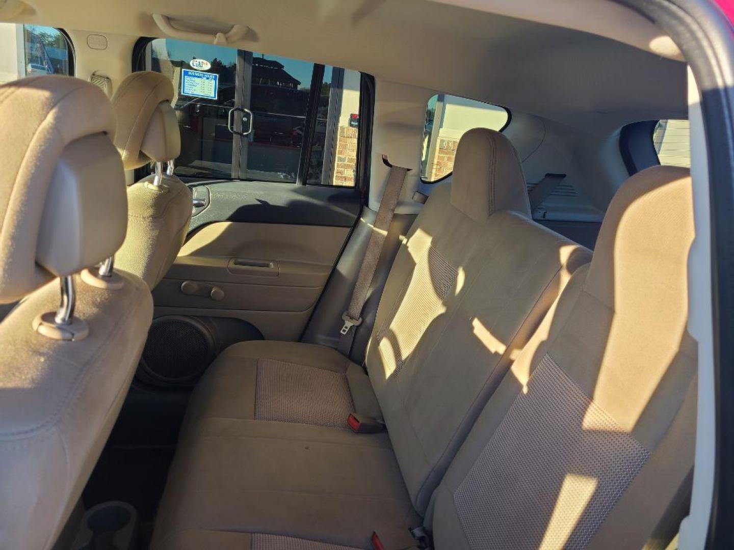 2014 RED JEEP COMPASS SPORT (1C4NJDBB9ED) with an 2.4L engine, 5-Speed Manual transmission, located at 13640 E Wade Hampton Blvd, Greer, SC, 29651, (864) 848-4040, 34.950825, -82.197464 - Photo#10