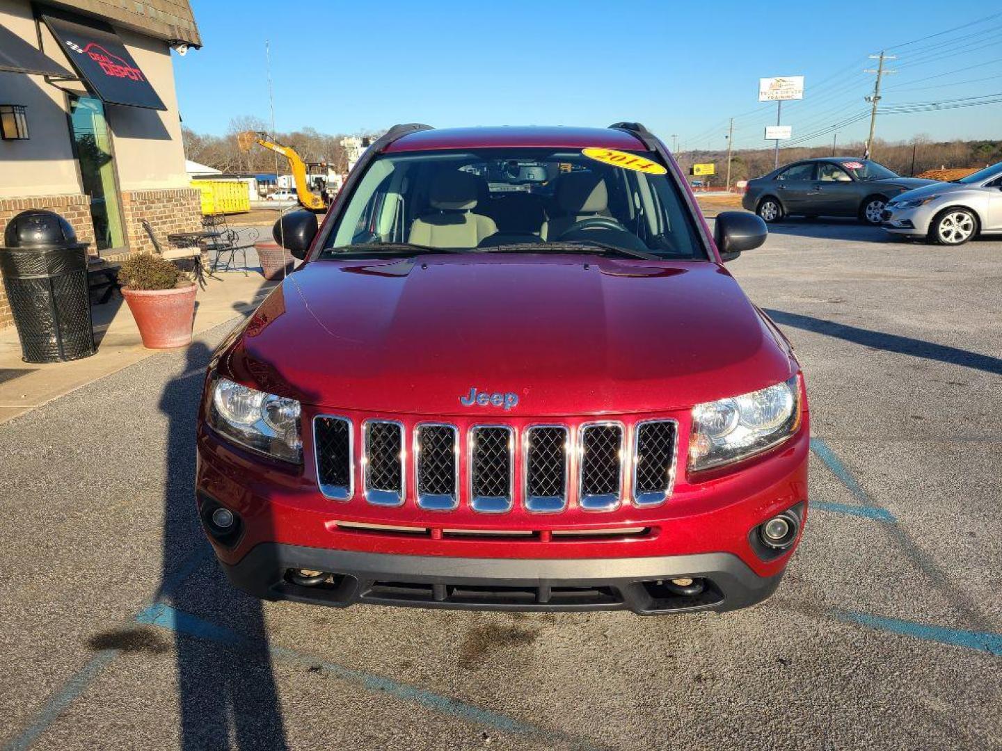 2014 RED JEEP COMPASS SPORT (1C4NJDBB9ED) with an 2.4L engine, 5-Speed Manual transmission, located at 13640 E Wade Hampton Blvd, Greer, SC, 29651, (864) 848-4040, 34.950825, -82.197464 - Photo#2