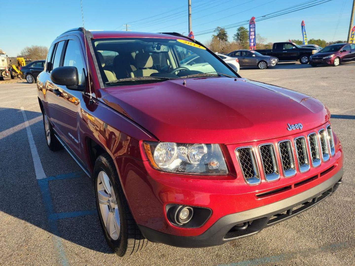 2014 RED JEEP COMPASS SPORT (1C4NJDBB9ED) with an 2.4L engine, 5-Speed Manual transmission, located at 13640 E Wade Hampton Blvd, Greer, SC, 29651, (864) 848-4040, 34.950825, -82.197464 - Photo#3