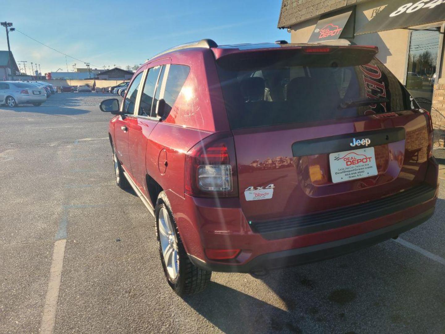 2014 RED JEEP COMPASS SPORT (1C4NJDBB9ED) with an 2.4L engine, 5-Speed Manual transmission, located at 13640 E Wade Hampton Blvd, Greer, SC, 29651, (864) 848-4040, 34.950825, -82.197464 - Photo#4