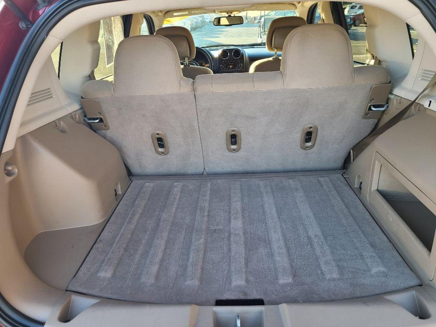 2014 RED JEEP COMPASS SPORT (1C4NJDBB9ED) with an 2.4L engine, 5-Speed Manual transmission, located at 13640 E Wade Hampton Blvd, Greer, SC, 29651, (864) 848-4040, 34.950825, -82.197464 - Photo#7