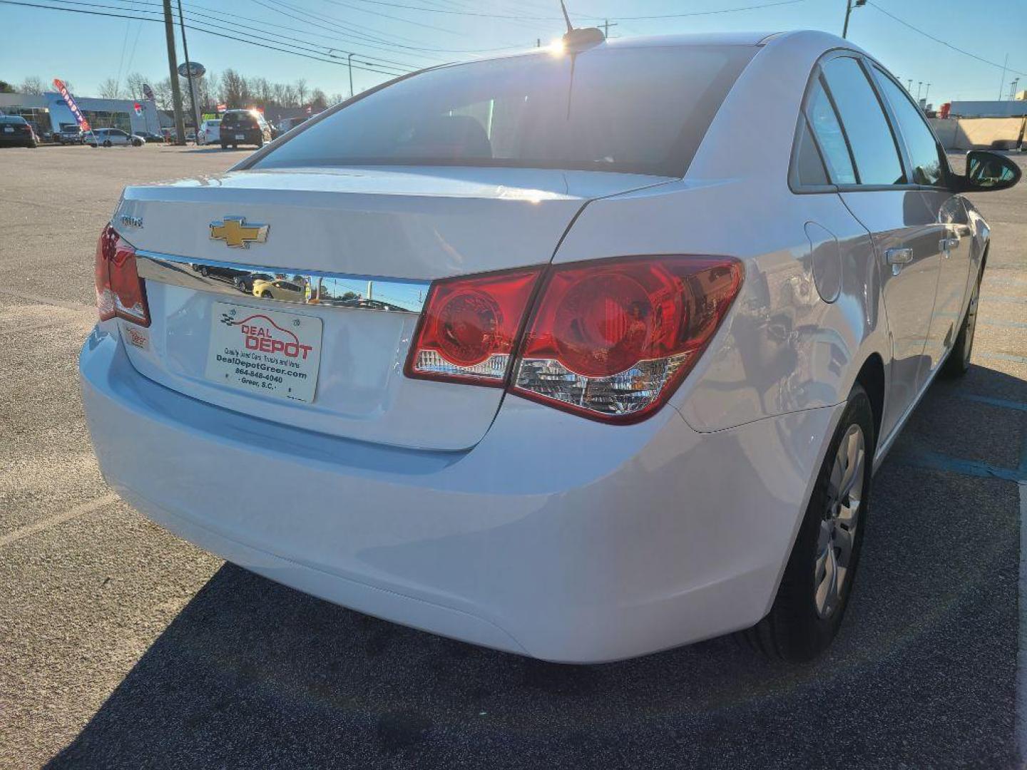 2015 WHITE CHEVROLET CRUZE LS AUTO (1G1PA5SG3F7) with an 1.8L engine, Automatic transmission, located at 13640 E Wade Hampton Blvd, Greer, SC, 29651, (864) 848-4040, 34.950825, -82.197464 - Photo#6