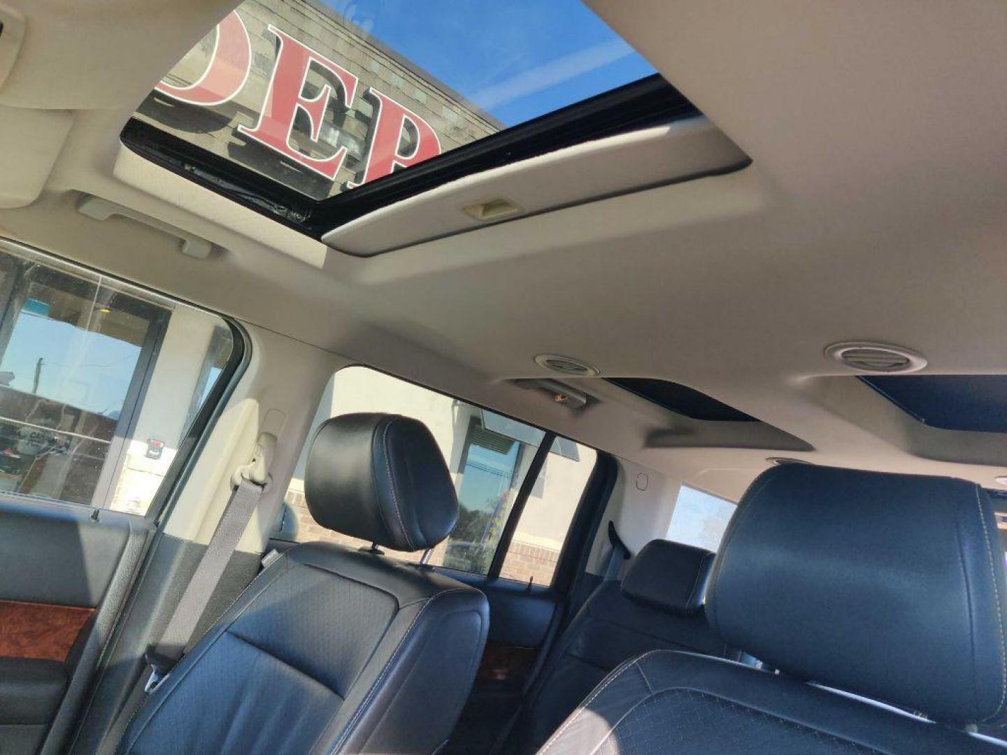 2011 BLACK FORD FLEX LIMITED (2FMGK5DC9BB) with an 3.5L engine, Automatic transmission, located at 13640 E Wade Hampton Blvd, Greer, SC, 29651, (864) 848-4040, 34.950825, -82.197464 - Photo#9