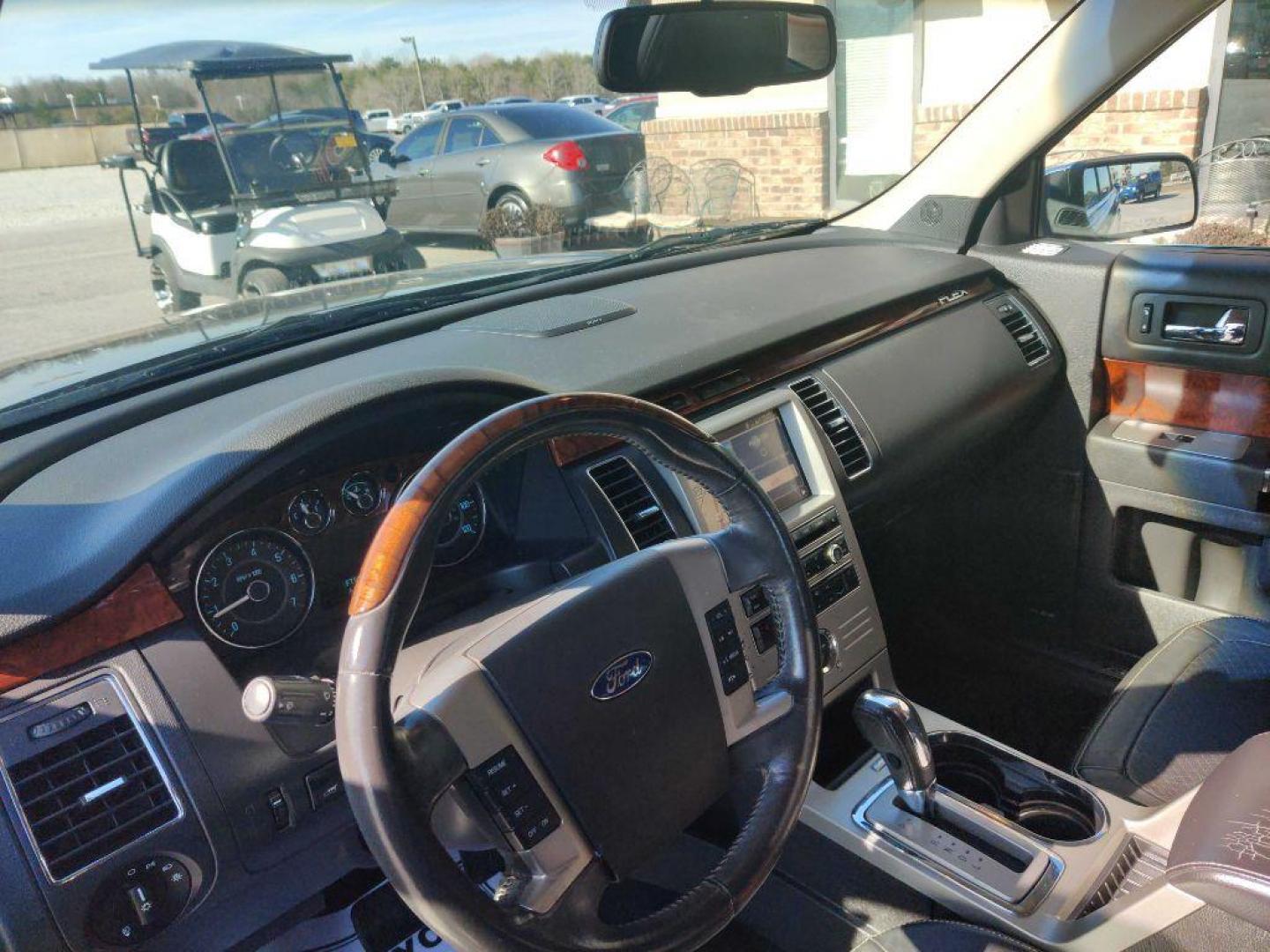 2011 BLACK FORD FLEX LIMITED (2FMGK5DC9BB) with an 3.5L engine, Automatic transmission, located at 13640 E Wade Hampton Blvd, Greer, SC, 29651, (864) 848-4040, 34.950825, -82.197464 - Photo#7